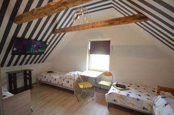 Фото номера Четырехместный номер Гостевой дом Martin Guest House г. Вентспилс 2