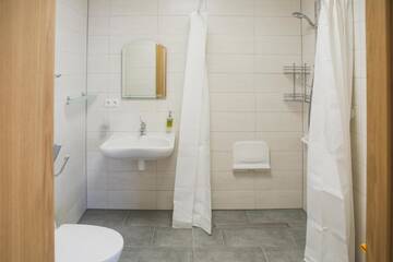 Фото номера Апартаменты-студио на 1 этаже Апартаменты Ventspils Rātslaukuma apartamenti г. Вентспилс 5