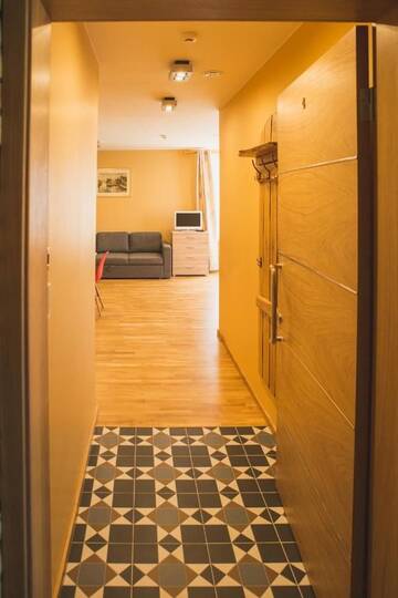 Фото номера Апартаменты-студио на 1 этаже Апартаменты Ventspils Rātslaukuma apartamenti г. Вентспилс 7