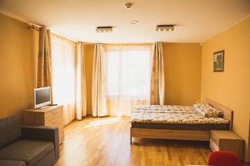 Фото номера Апартаменты-студио на 1 этаже Апартаменты Ventspils Rātslaukuma apartamenti г. Вентспилс 4