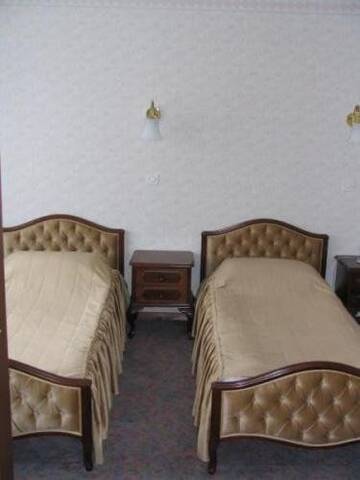 Фото номера Роскошный двухместный номер с 2 отдельными кроватями Отель Hotel Vilnis г. Вентспилс 5