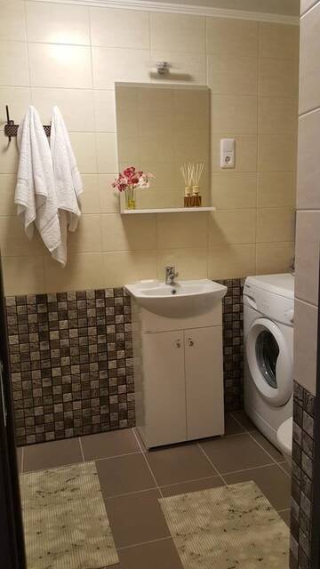 Фото номера Апартаменты с балконом Апартаменты L.E.C. Travel Apartments Ventspils г. Вентспилс 9