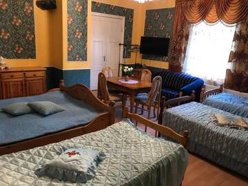 Фото номера Cемейный номер с собственной ванной комнатой Гостевой дом Villa Magonīte г. Вентспилс 8
