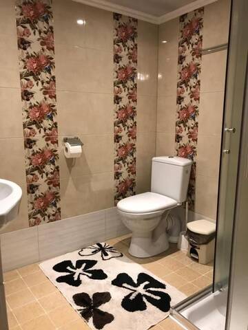 Фото номера Cемейный номер с собственной ванной комнатой Гостевой дом Villa Magonīte г. Вентспилс 11