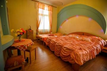 Фото номера Четырехместный номер - Оранжевый Гостевой дом Villa Magonīte г. Вентспилс 2