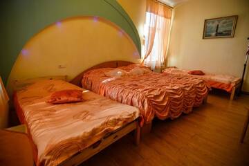 Фото номера Четырехместный номер - Оранжевый Гостевой дом Villa Magonīte г. Вентспилс 3